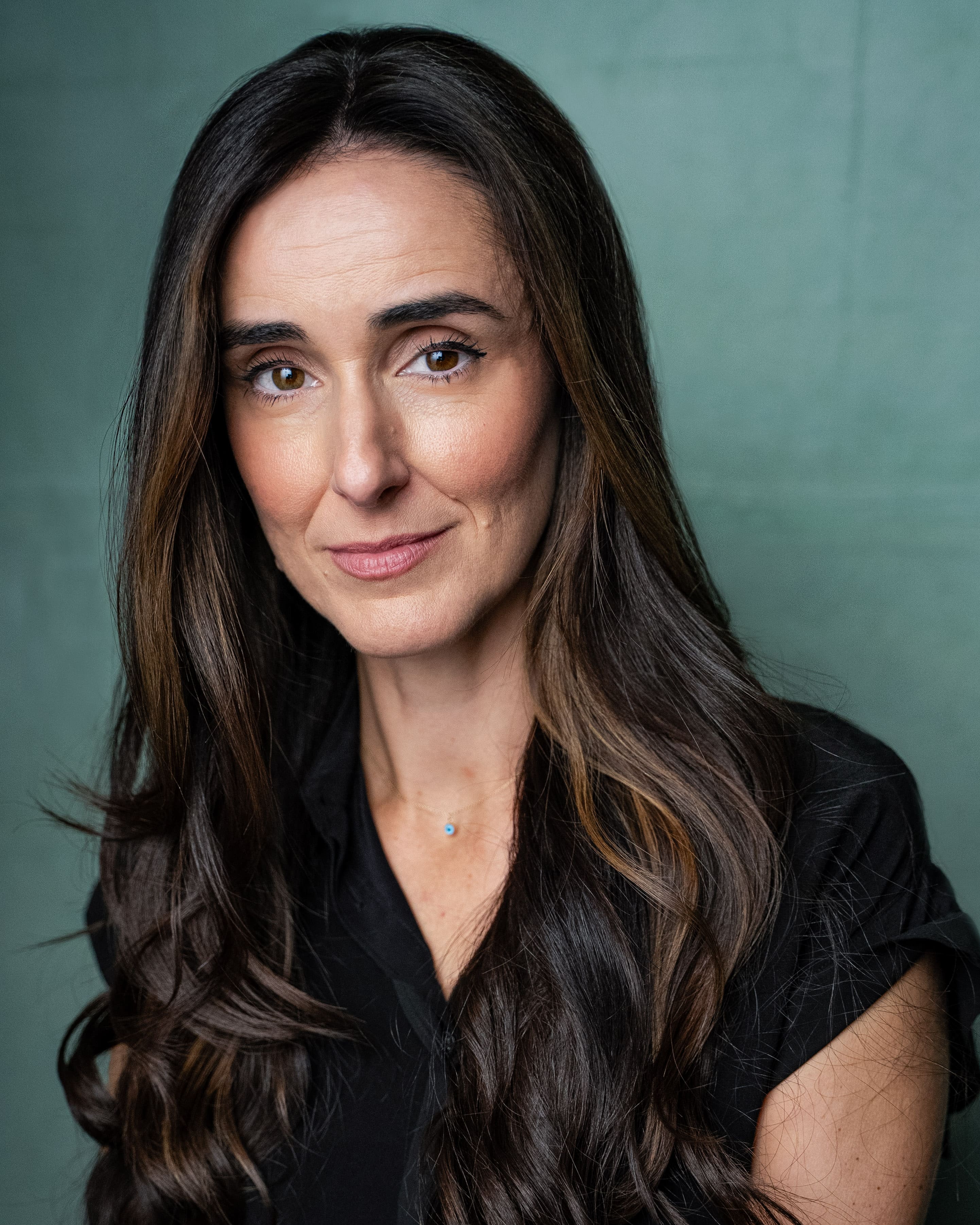 68f8a9da4ee7f_Headshot2025 11.jpg